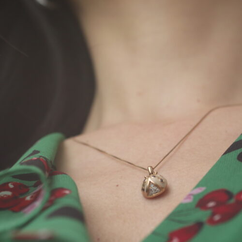 Baby Coccinella Pendant in Baby Pink Wearing Mother