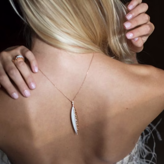 Model dancing in evening gown with MIYOCO Necklace with Nature inspired design