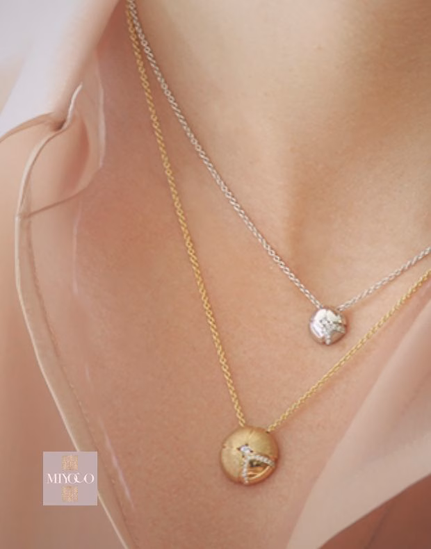Layering necklace guide - Principles of Elegant Necklace Layering